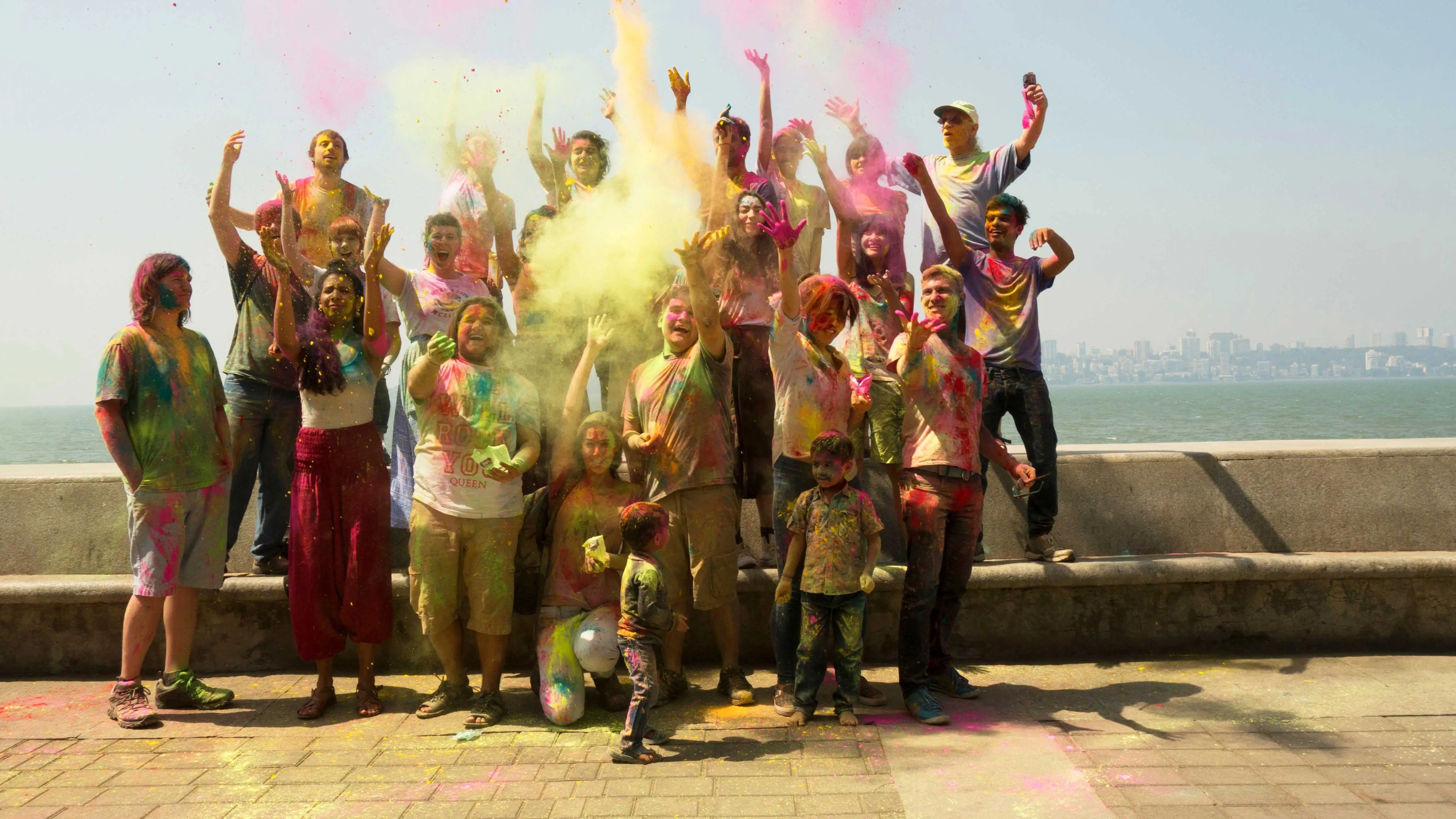 Students celebrating Holi, the festival of colors in Mumbai, India.