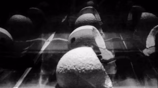 A melon or helm in the background. There are multiple of them.