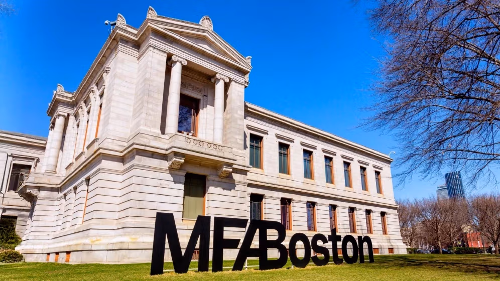 Photo of the Museum of Fine Art Boston on a sunny day with event details