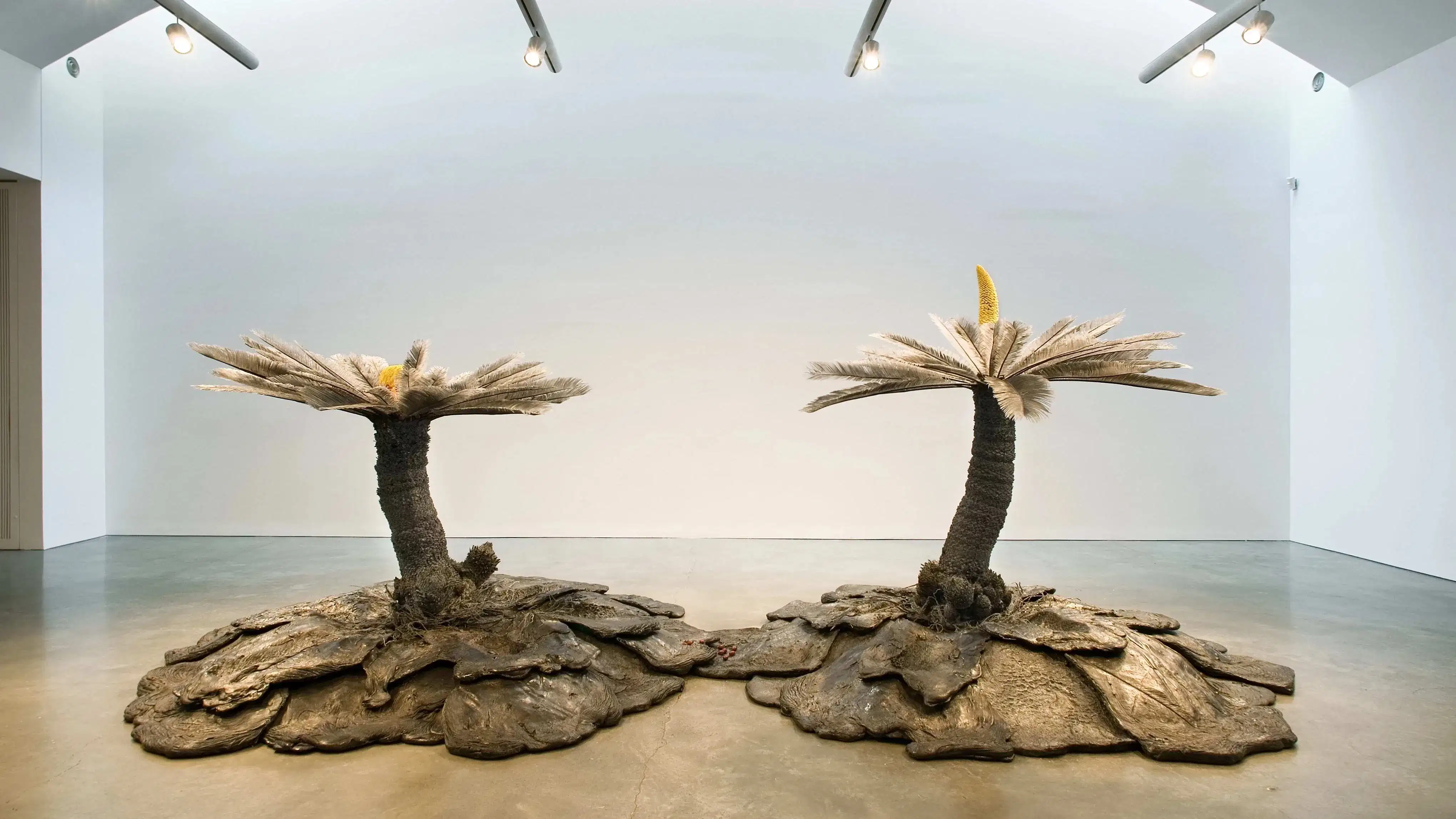 Keith Edmier, Cycas Orogeny, 2003-2004 basalt, polyurethane, acrylic paint, and Cycas revoluta pollen. 88 1/2 x 247 3/4 x 123 1/4 inches.  