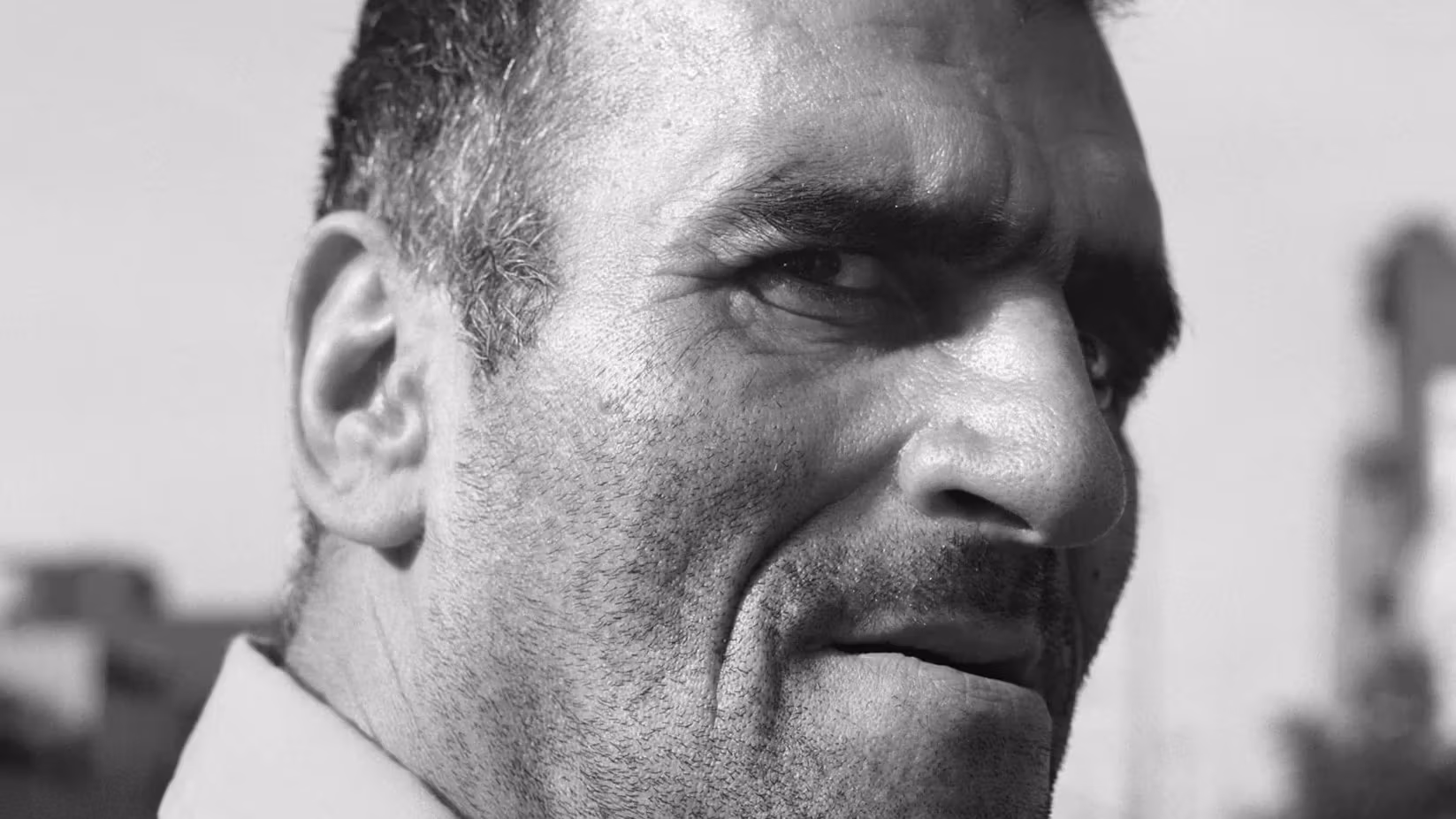 Black and white photographic portrait of a man