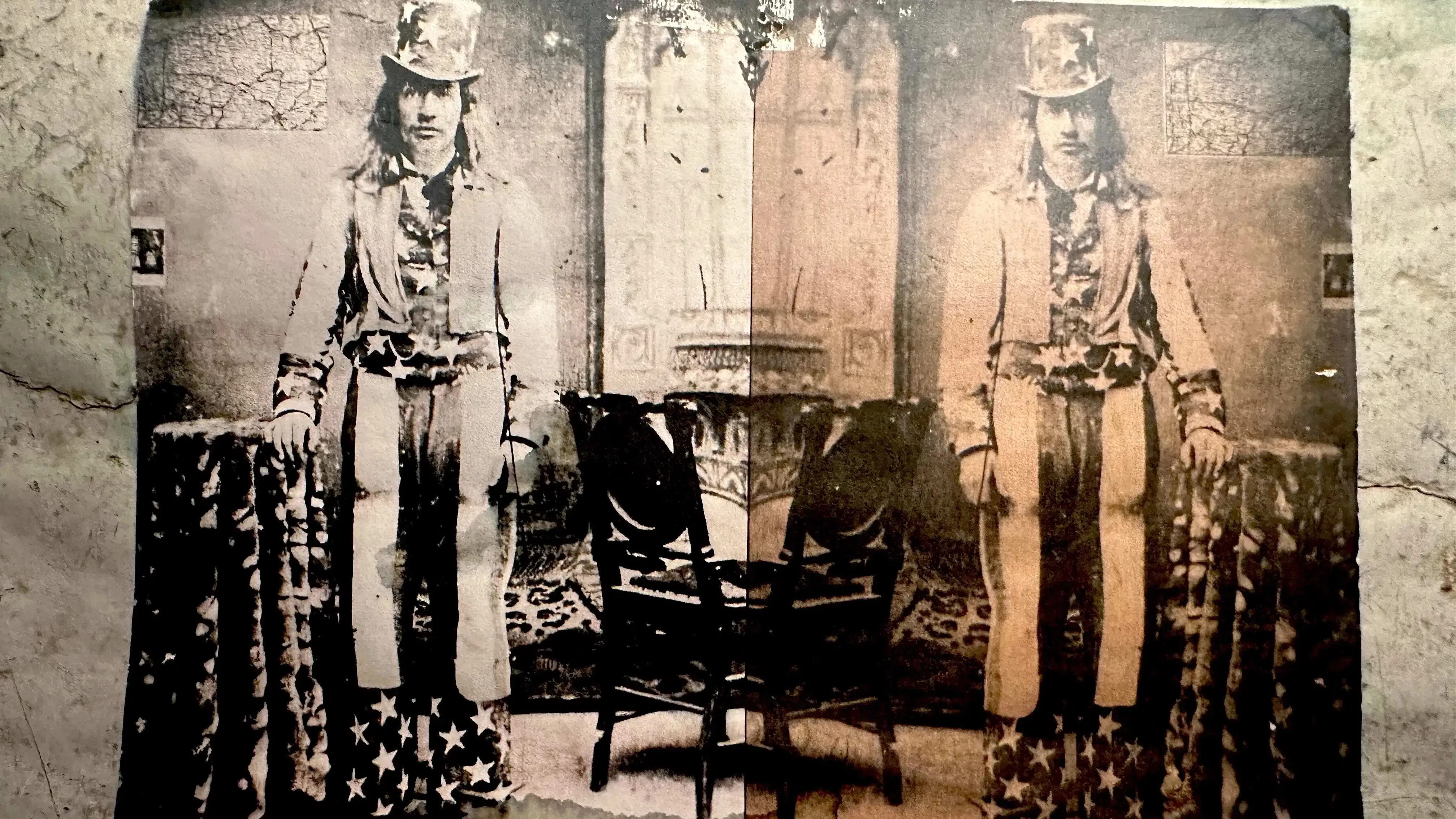 Picture of a mirrored image of a man dressed as uncle sam in black and white and sepia tone.