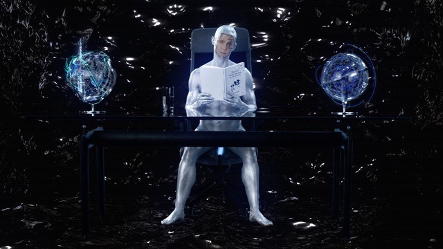 A person in a metallic silver, skin-tight suit sits at a desk looking at a book 