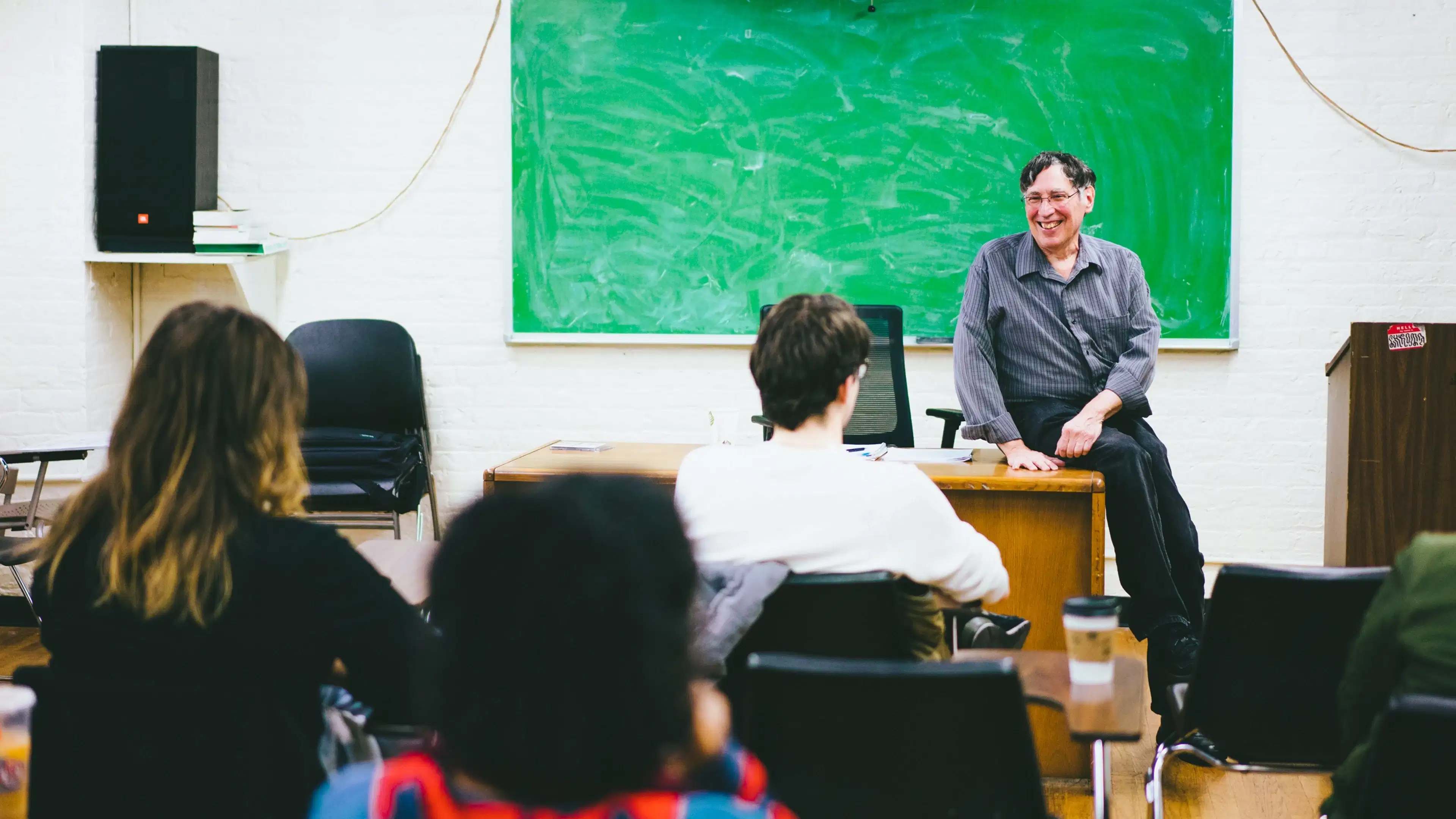 Teacher and Students in a classroom.