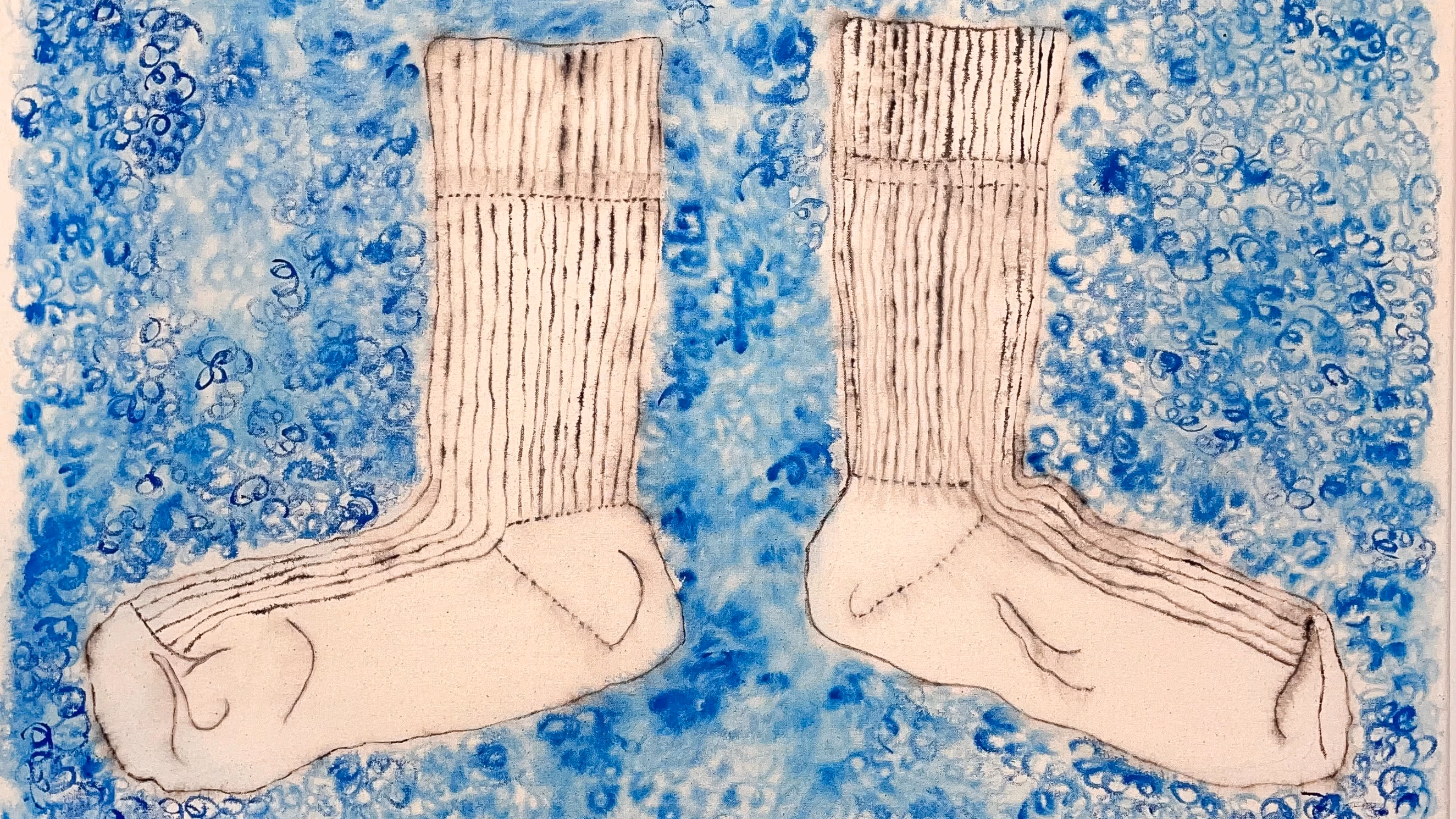 painting of a pair of socks on blue background