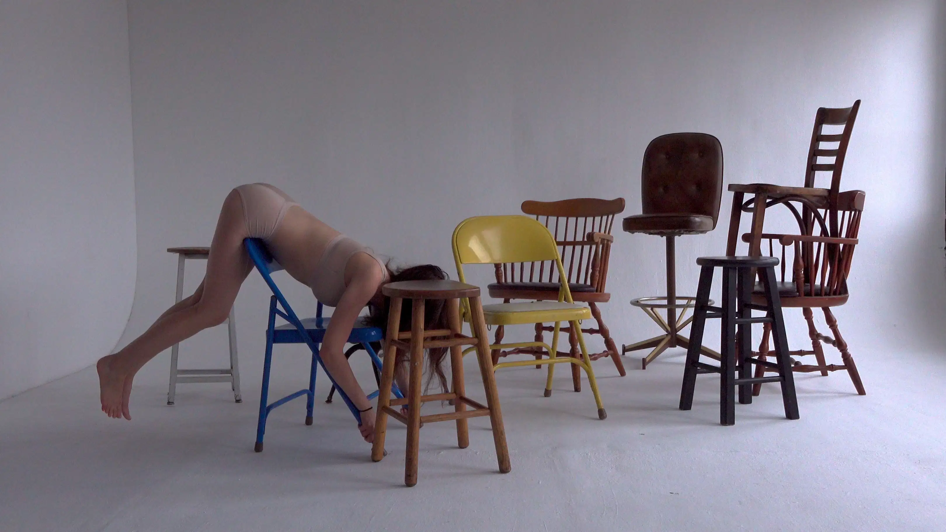 body on chairs photograph