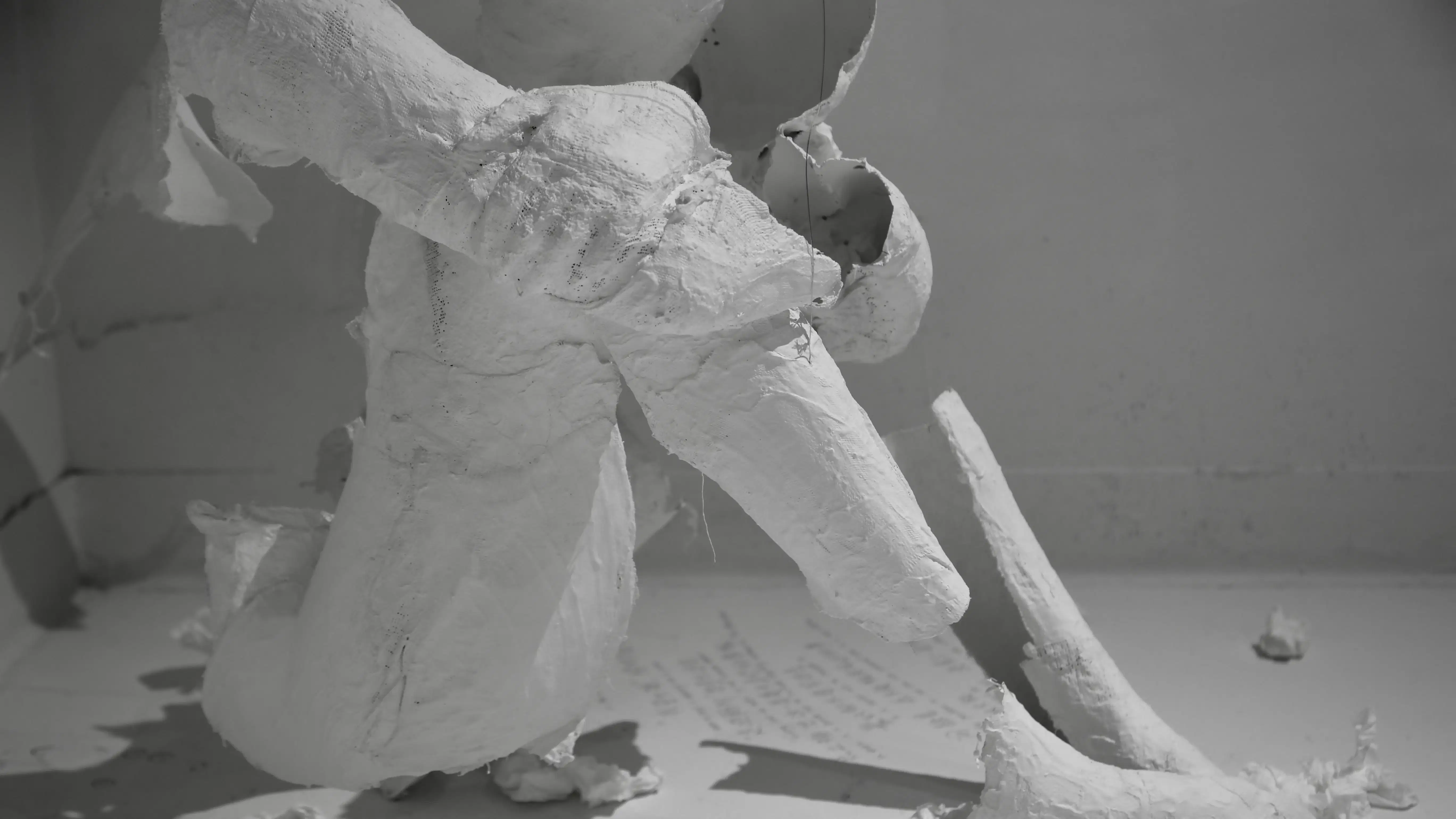 sculpture of a broken body