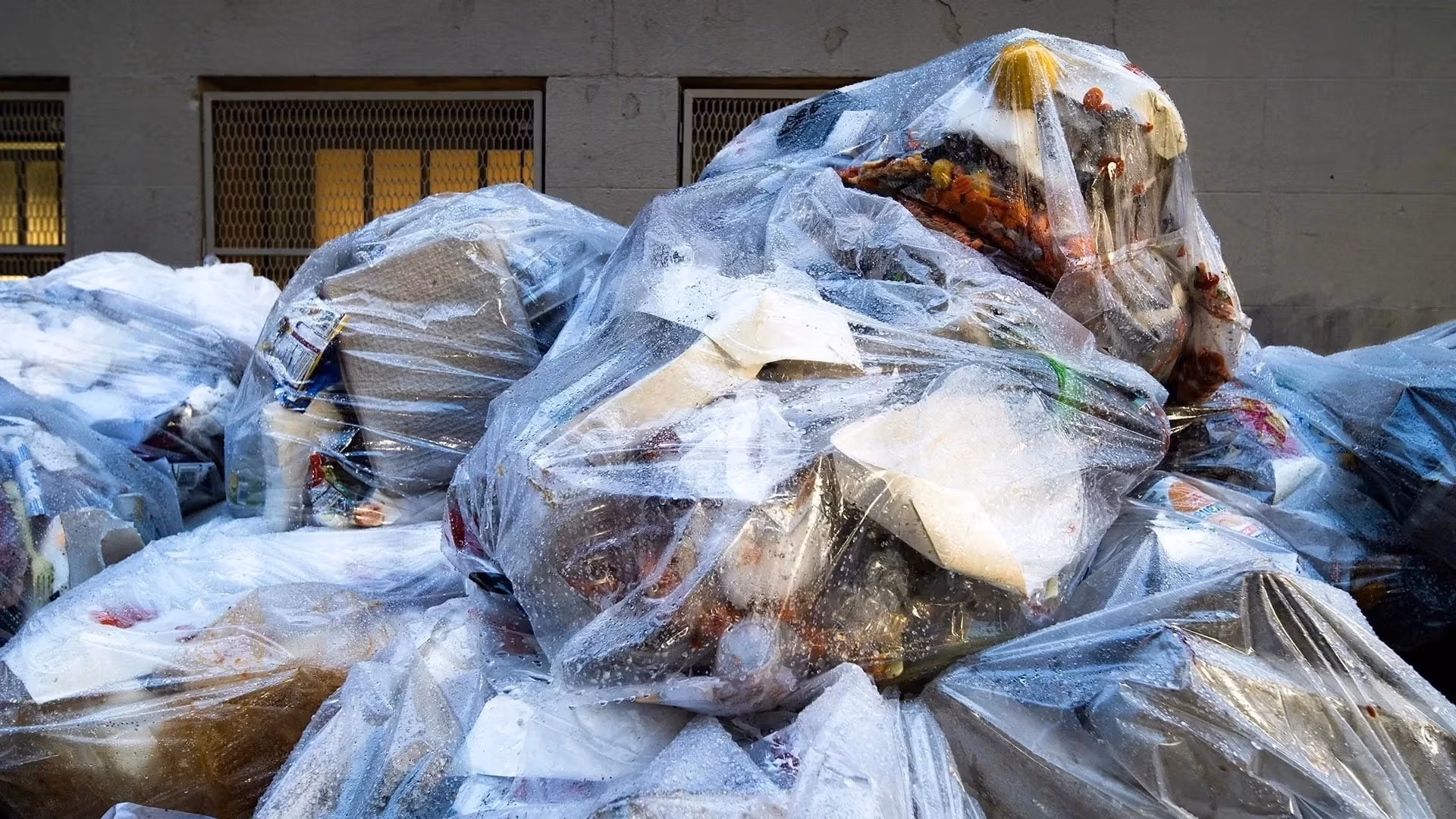 Pile of rubbish bags taking over the sidewalk in New York City