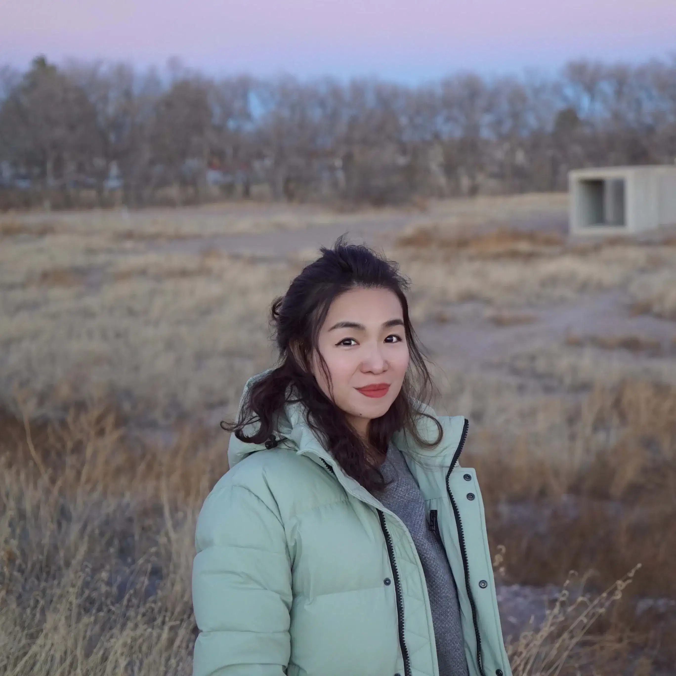 woman in green jacket