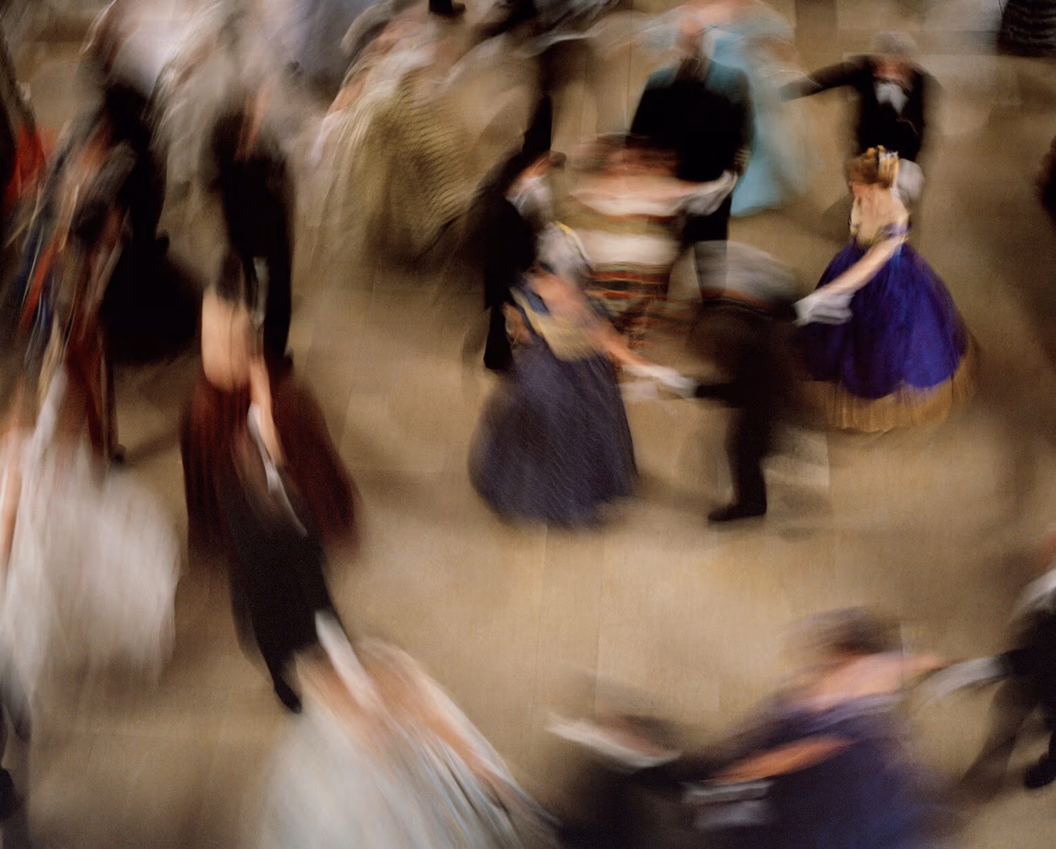 A painting of a blurred birds eye view of people dancing together