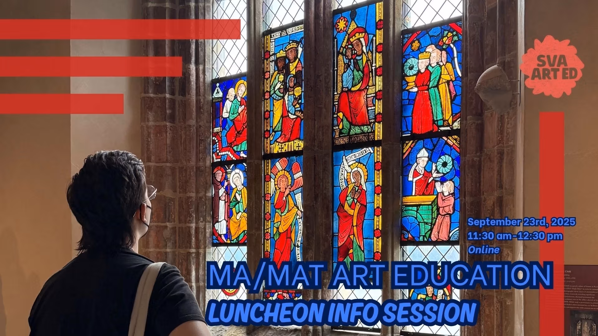 A person with their back turned to the camera looks up at stained glass windows.