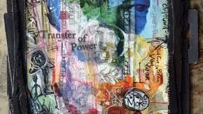 A black border surrounds a piece of colorful artwork. A face is visible in the colors of the art.