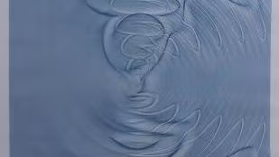 " A stone drop in water design on cloth "