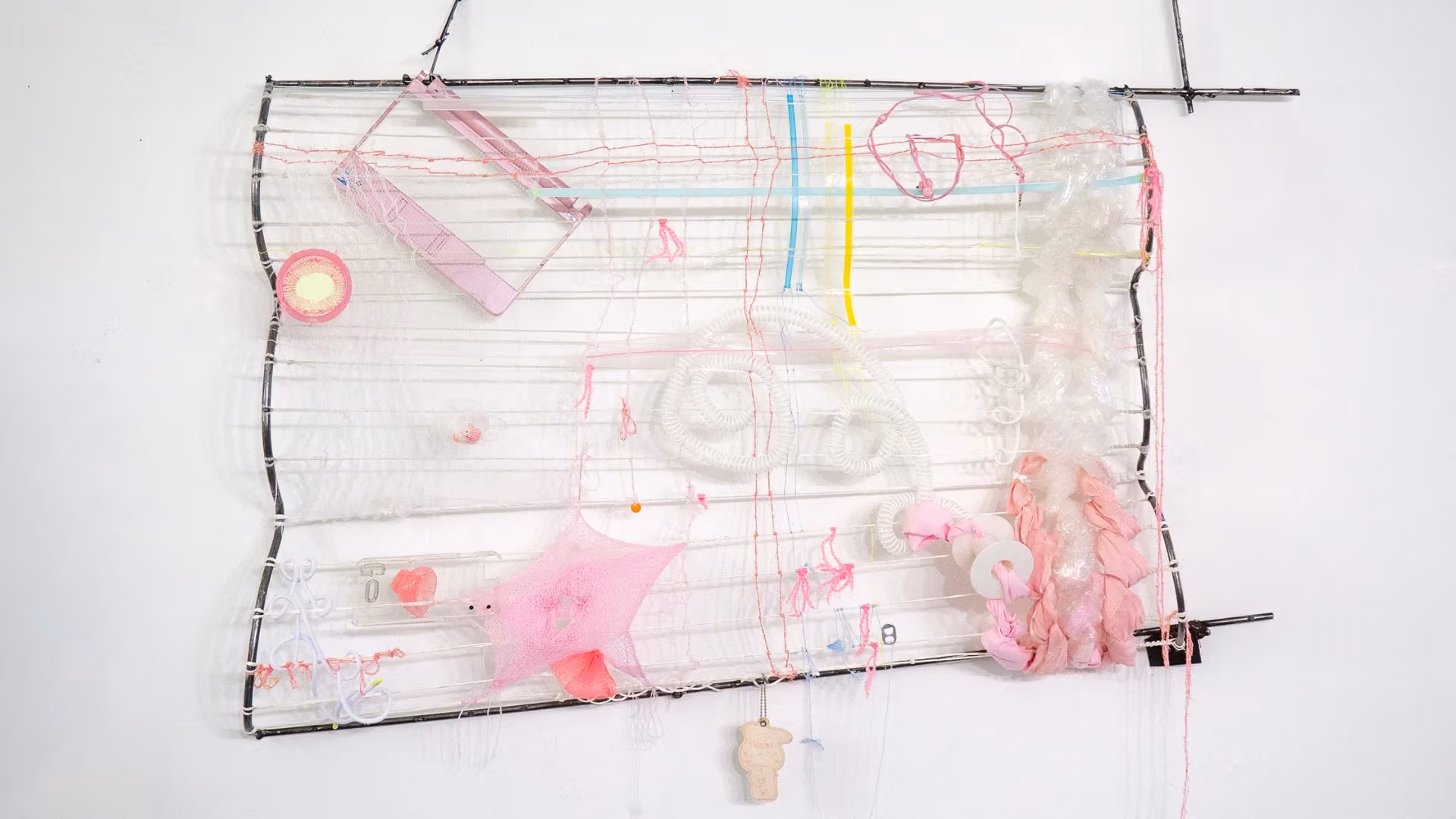 Sayo Watanabe, Dear Loved Ones I Missed, 2025, Welded found steel and objects, laptop remnant, pocket mirror, earphones, etc., 31 x 47 x 6 inches.