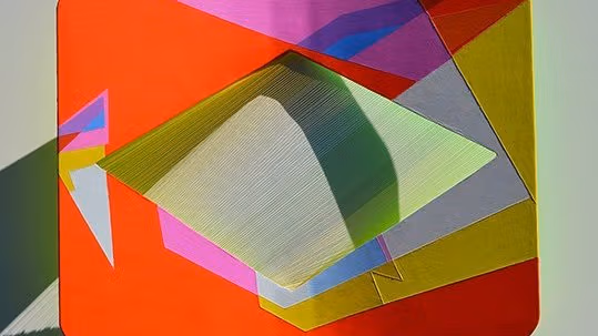 A multicolored square with a diamond cutout