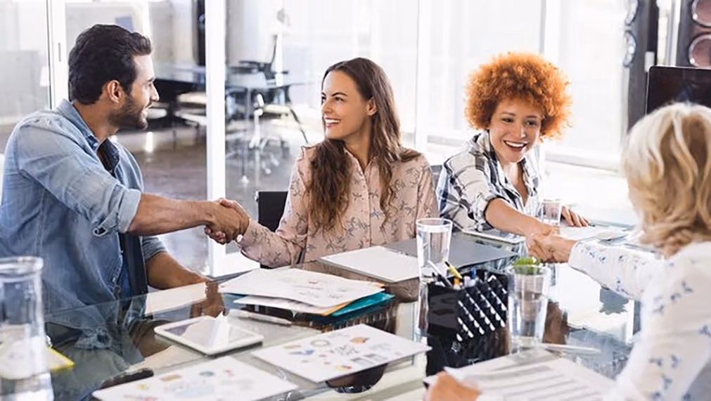 Coworkers in a conference room.