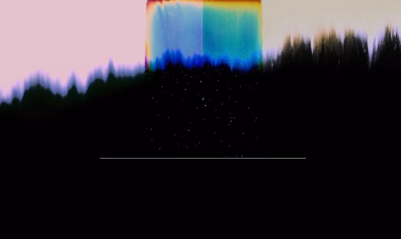 Abstract image with lower 3/4 of image in solid black in lines of various heights, and in the top center of the frame is a rainbow-colored block against light pink.