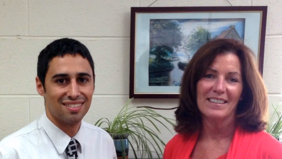 man and woman smiling