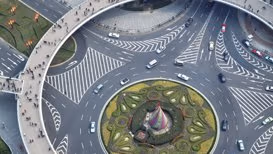 An aerial view of a roadway and pedestrian walkways.