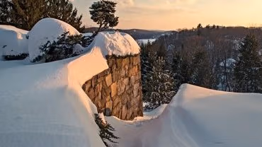 Snow covered foreground looking out over the valley