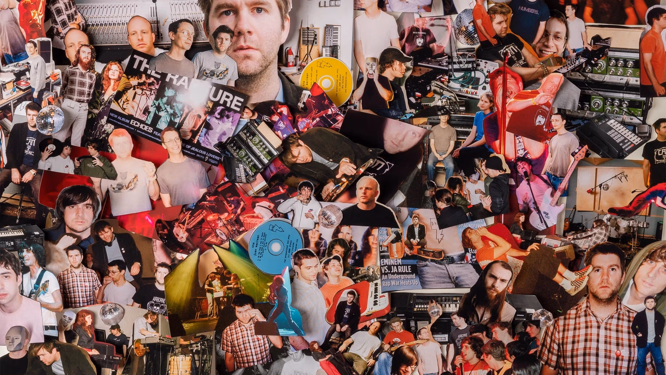 A color photograph of various cutouts of images that documented DFA Records, an indie record label. The majority of the cutouts are of people involved with the record label. 