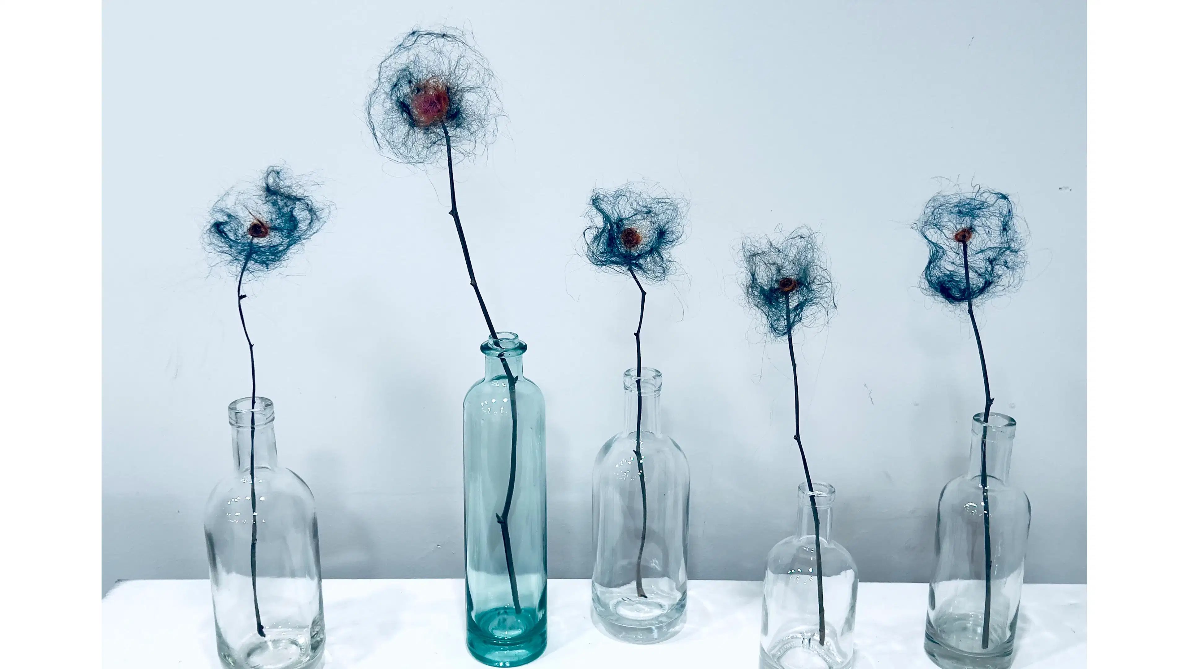 Jay Jansen, WHY BLUE?, 2023, Artist’s Hair, Hair Dye, Wood, Glass, 20” x 18” x 6”