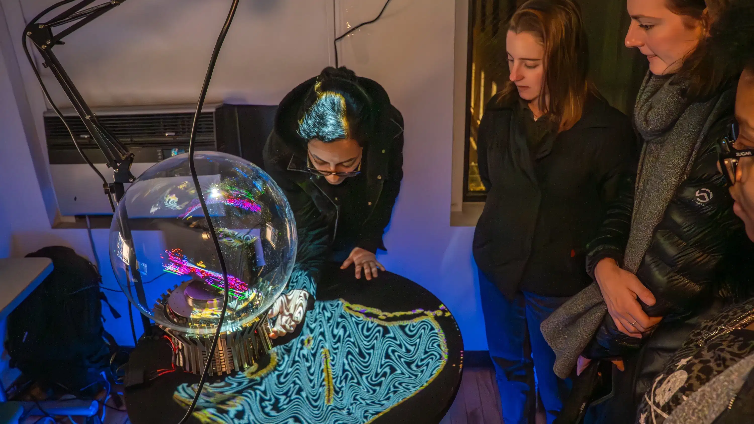 Maya Khalil, exhibiting their artwork at the Fall 2025 MFACA Open Studios.