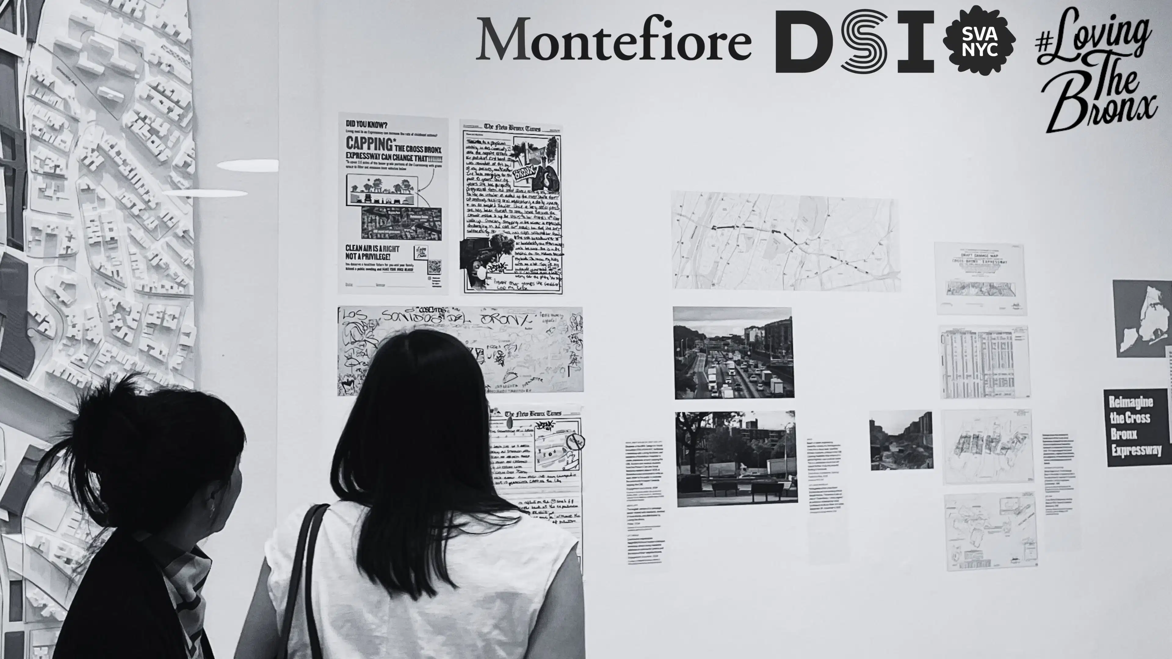 Black and white photo in art gallery with multiple pieces of work on wall and 2 silhouettes on the left side looking at the work. Logos of Montefiore, SVA DSI, #Loving the Bronx, in top right