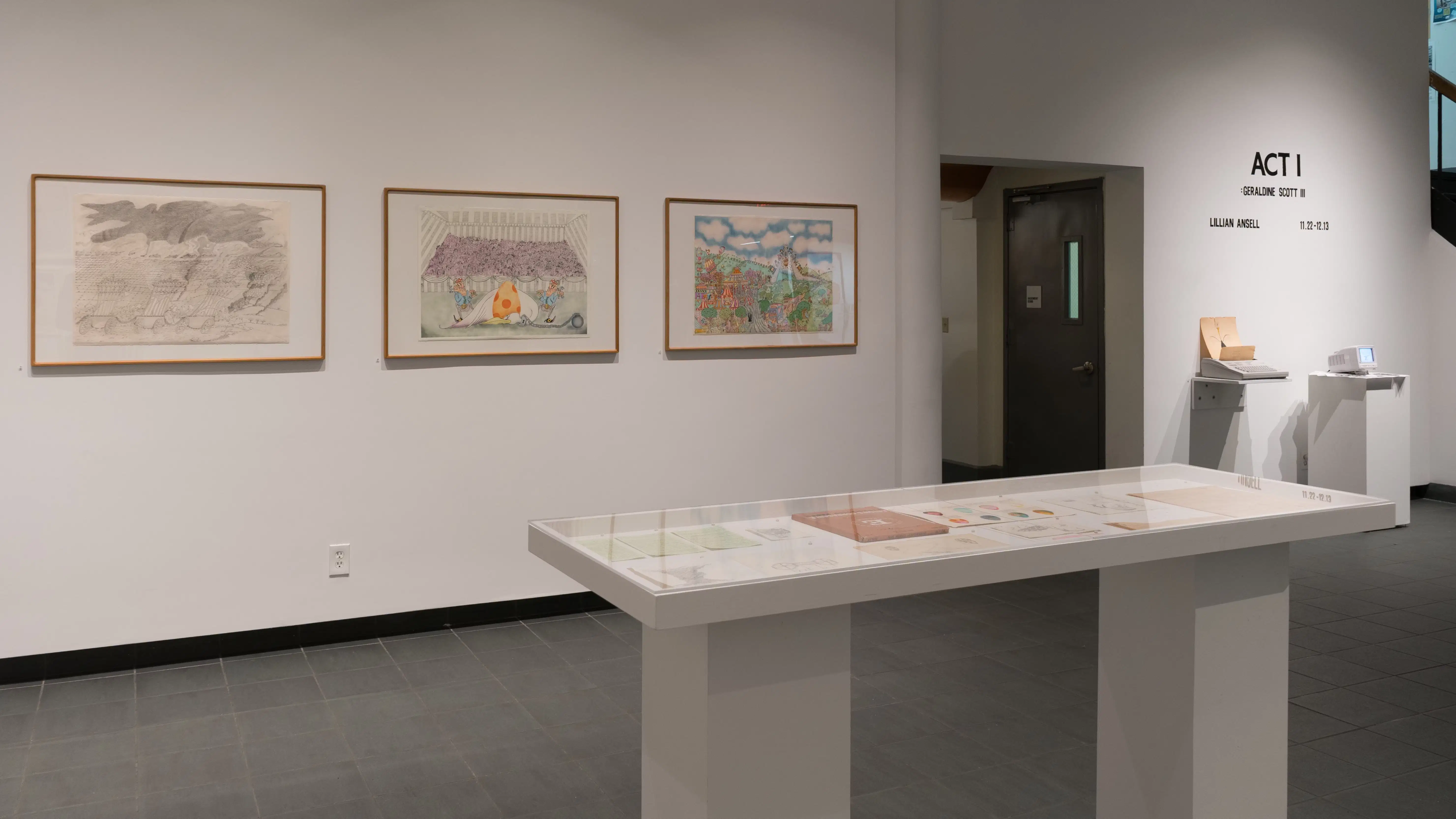 Left of the doorway to the hall, three large illustrations hang beside each other. Right of the doorway, wall vinyl reads “Act I: Garaldine Scott III” above shelves holding a typewriter and a miniature computer screen. A vitrine, in front of the walls, holds loose papers.
