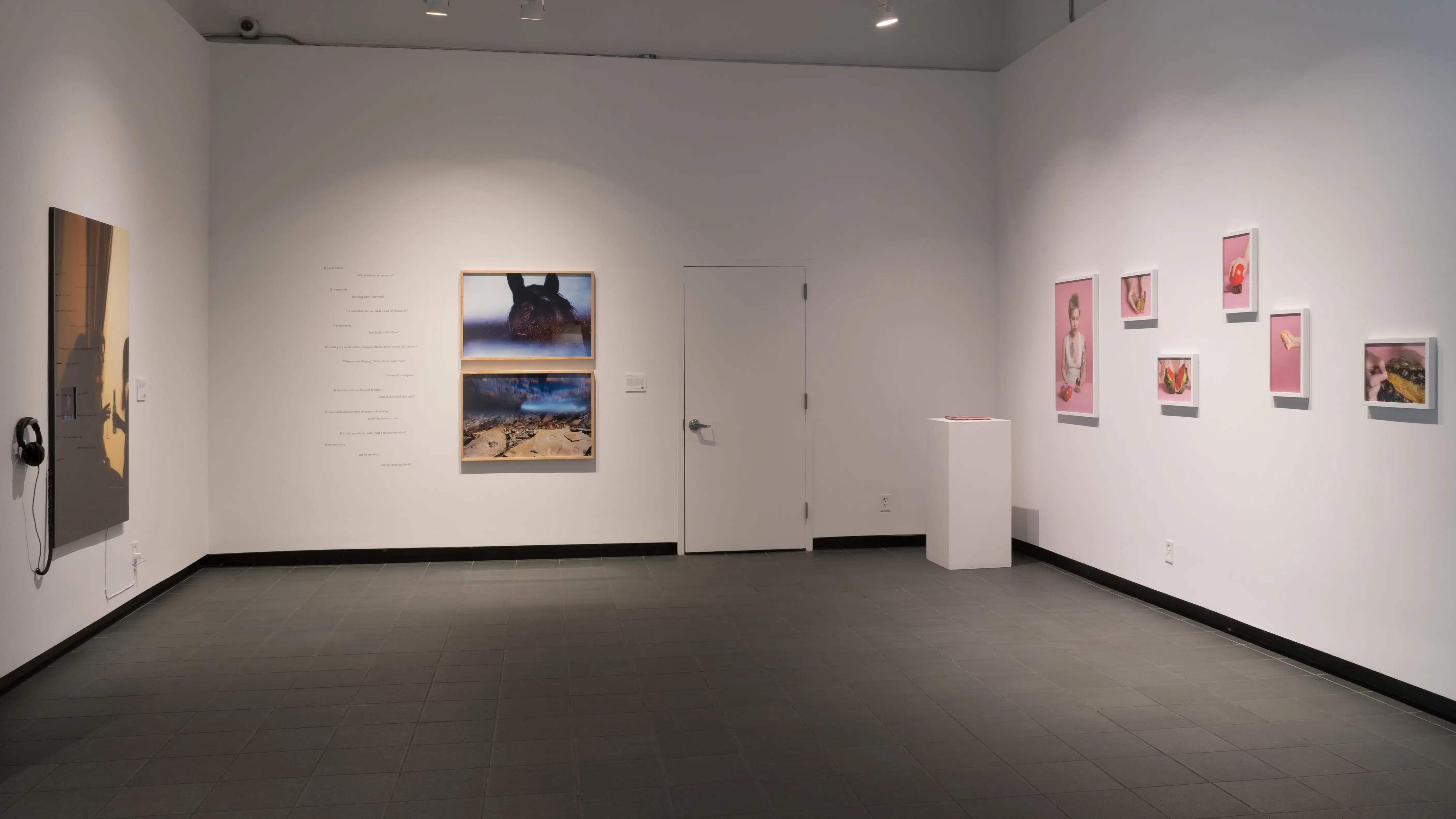 Looking into the SVA Gramercy Gallery, on the left wall is an image with headphones, on the far center wall are two framed photos with text beside it, and on the right are six photos hung apart.