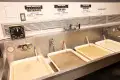A sink with tubs of film developing chemicals