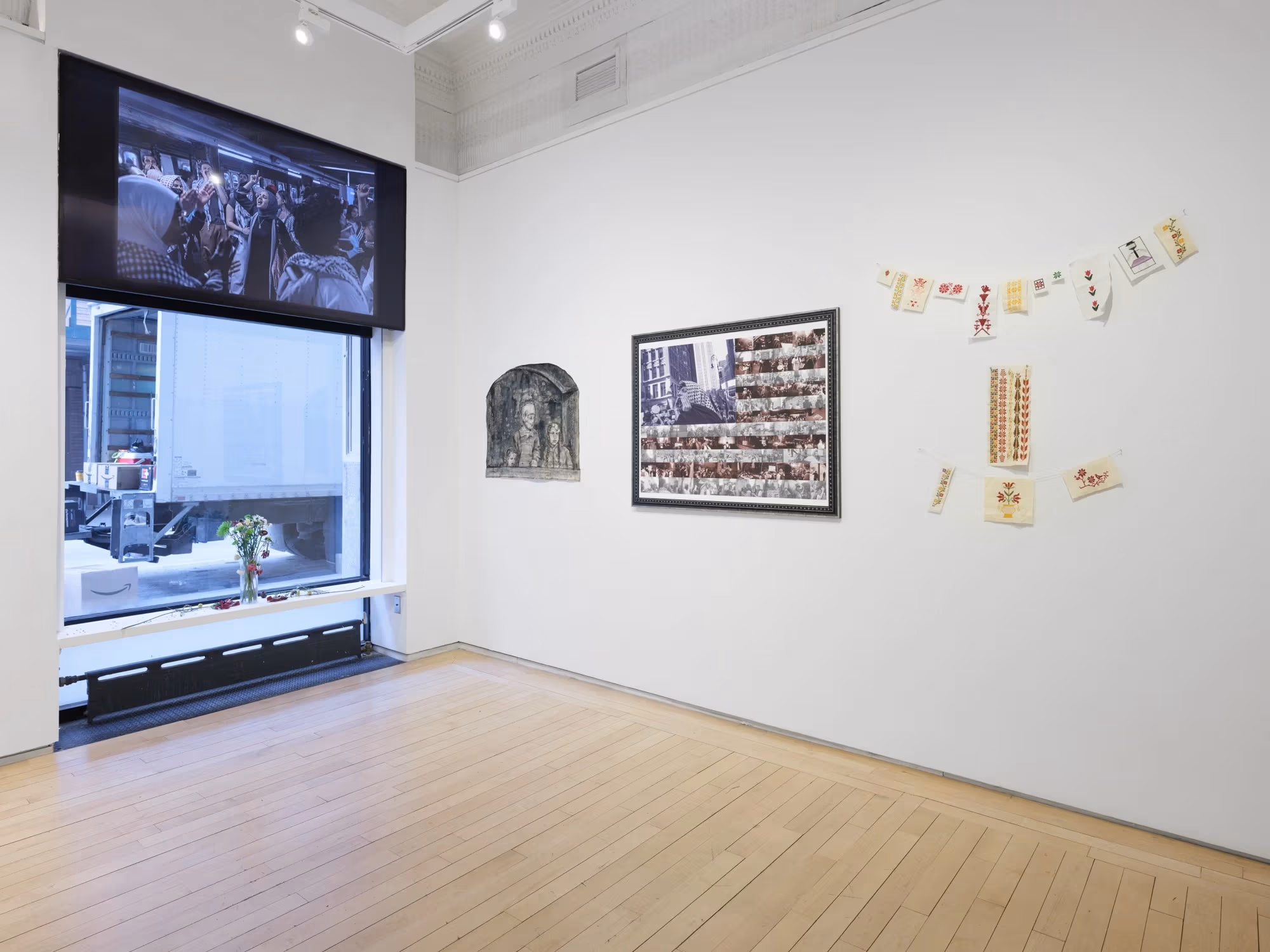 Installation of the exhibition in the Flatiron Project Space showing the west side walls.