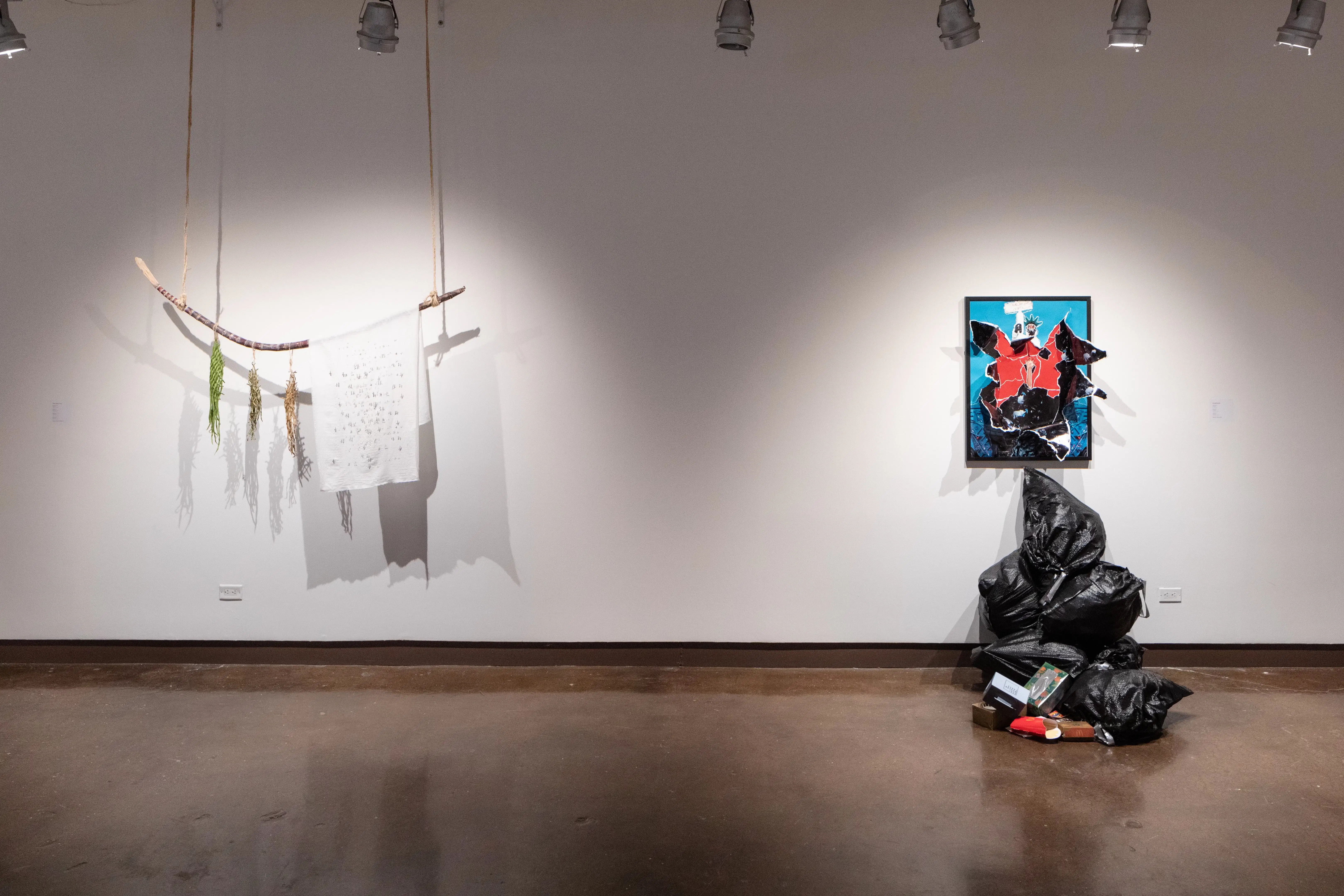 installation shot of two artists in the second gallery