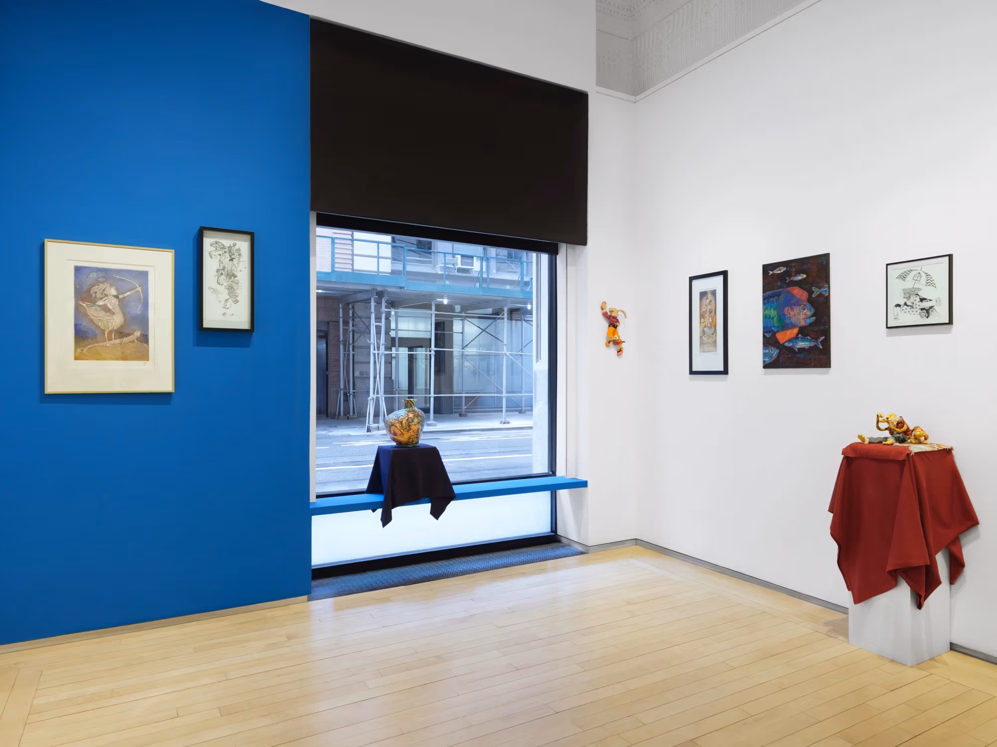 Inner Echoes installation shot, west side wall and front wall with large window that faces the street.