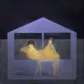 Two small sisters are riding a camel in the dark back to their home. 