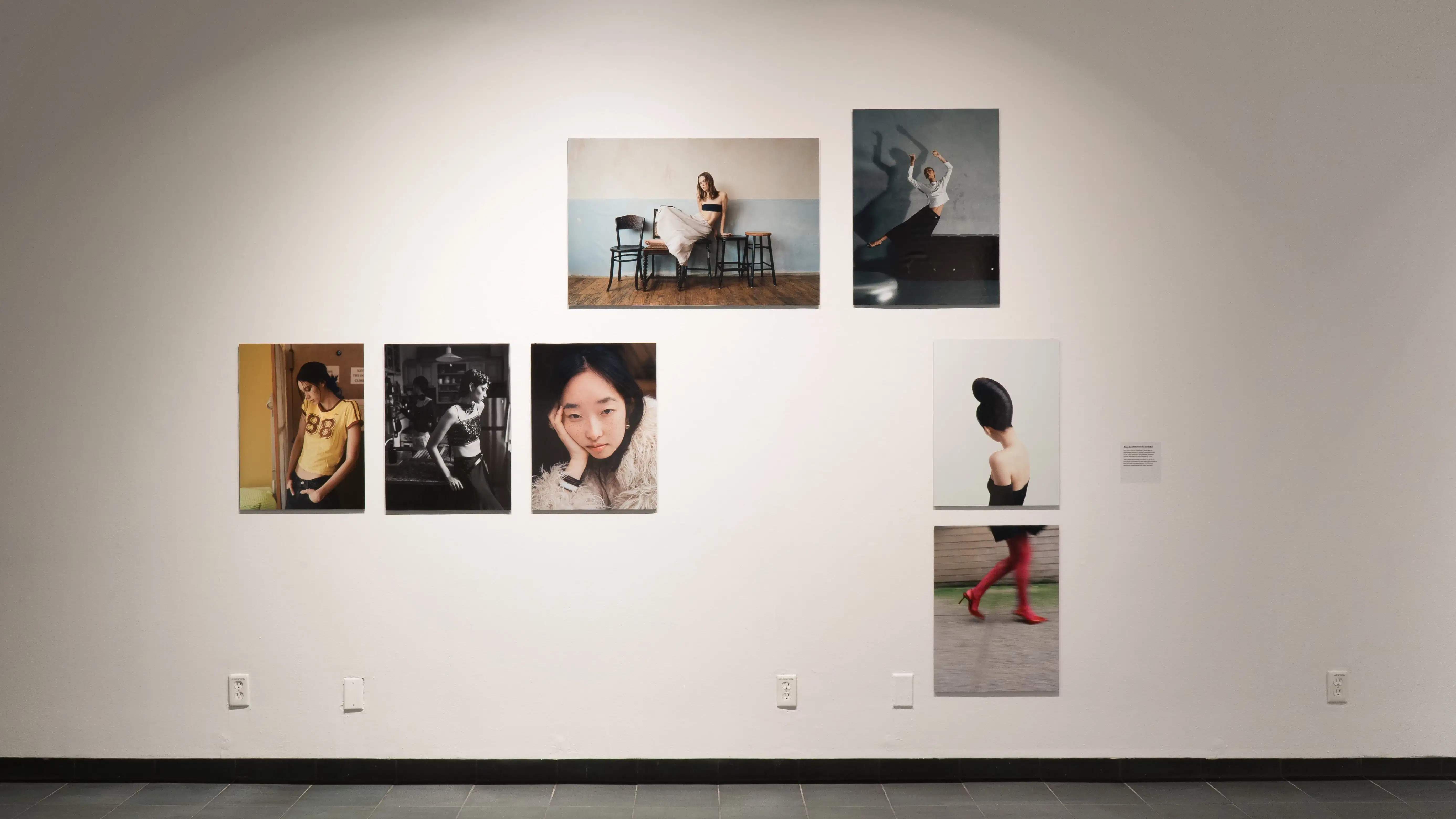 Several images featuring fashionable young people hanging on a white wall.