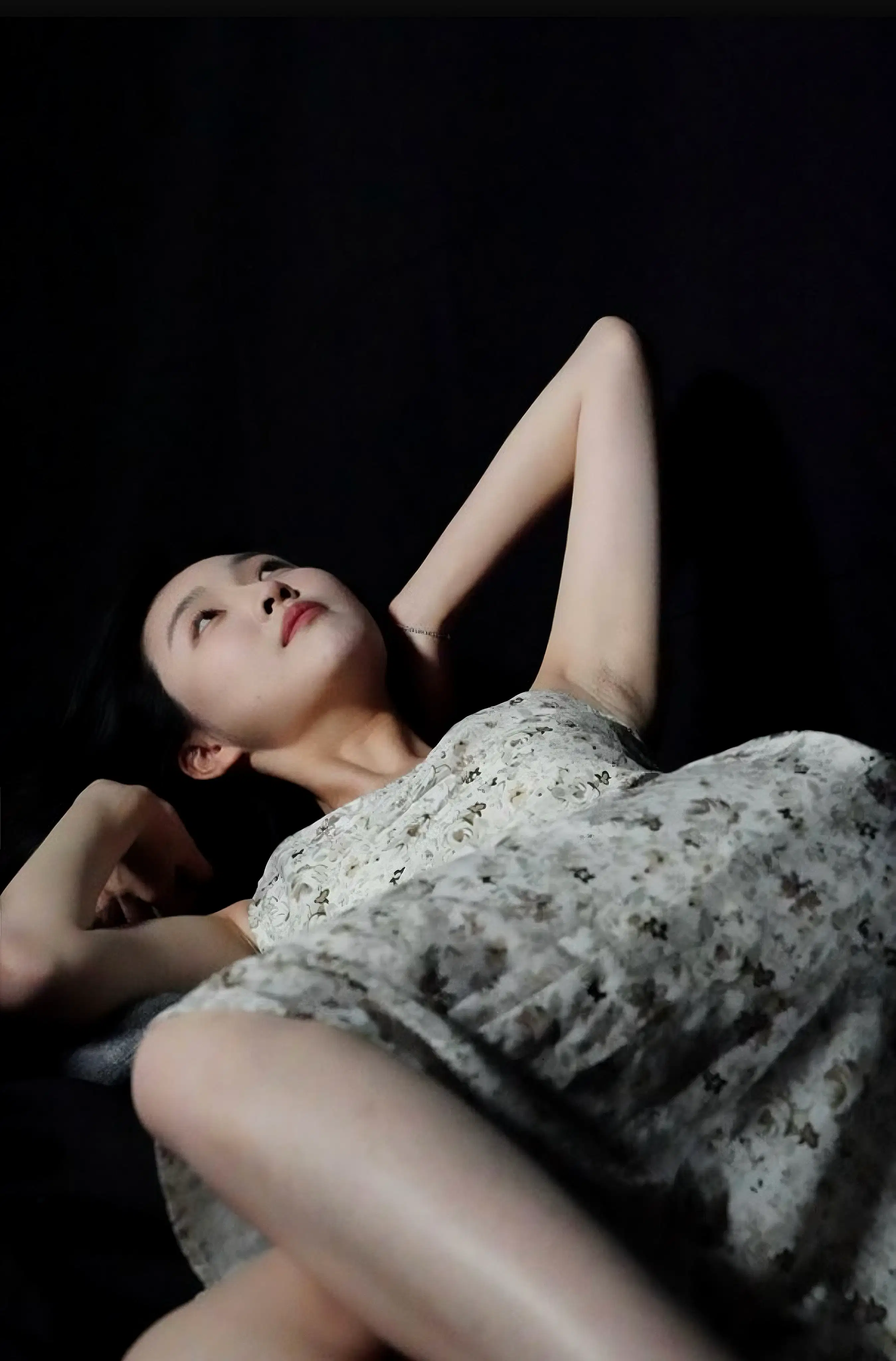 A woman shows off her elegant body frame.