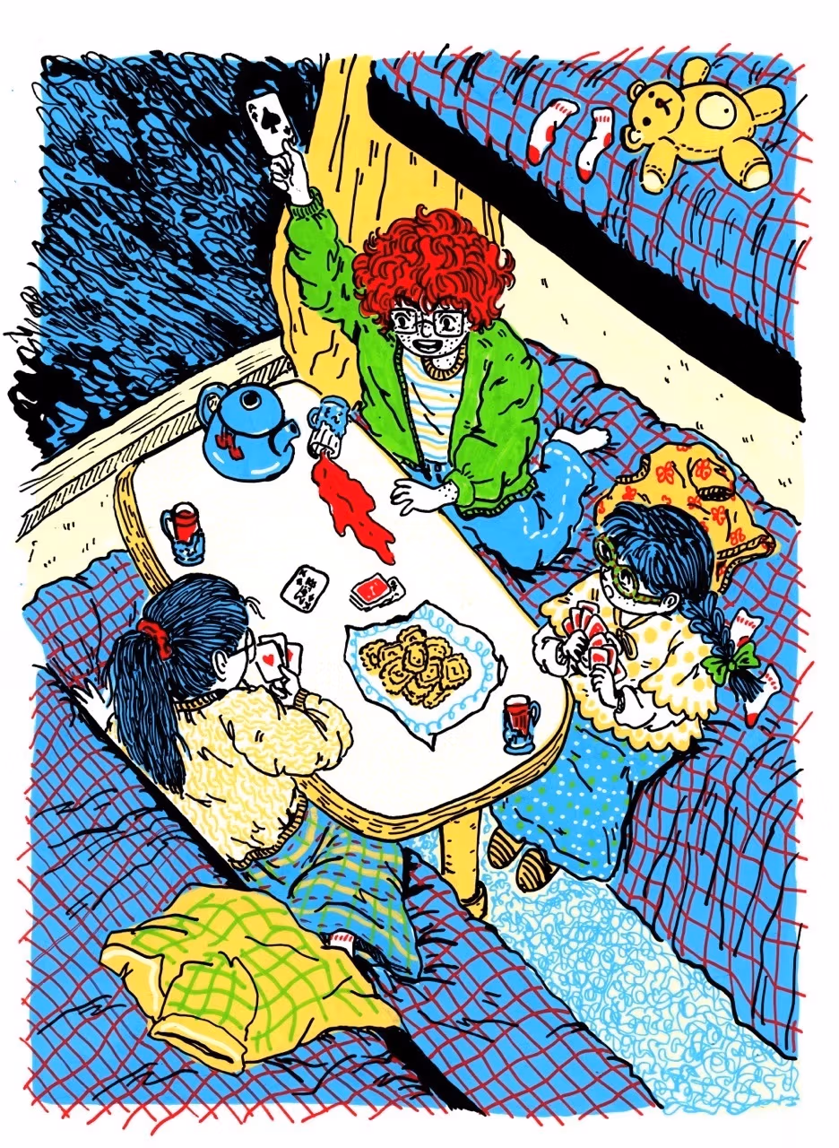 Three girls playing cards on a train in a compartment with a table that has three cups of tea, a teapot, and some cookies. 