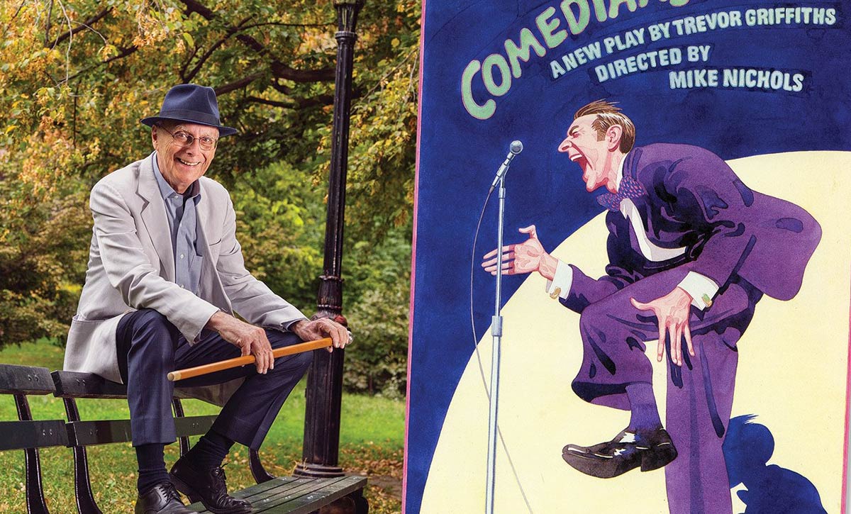 A photo of James McMullan by Vanity Fair opposite his first theater poster, for <em>Comedians</em>, in 1976.