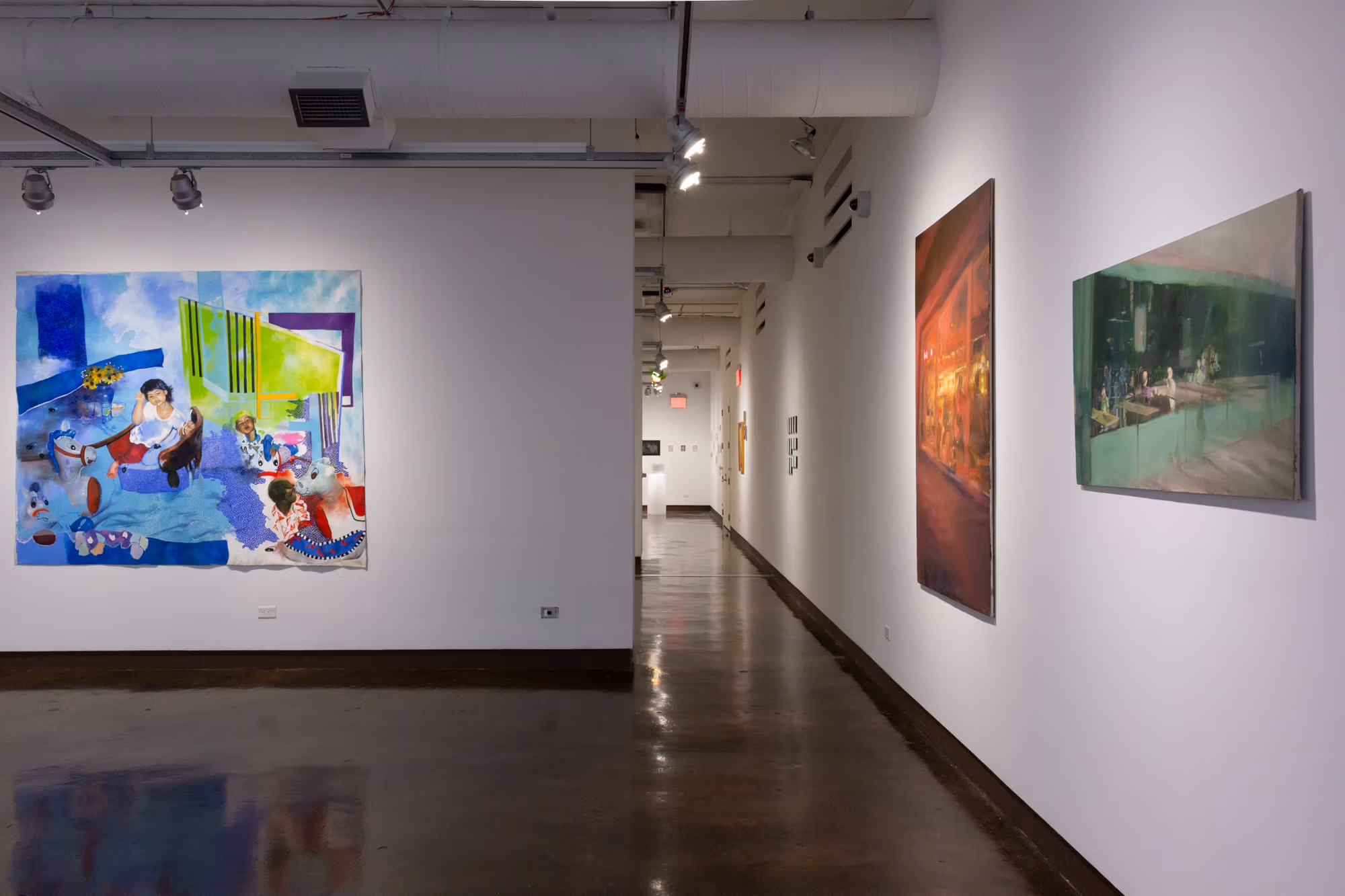 On the left is a large blue painting with a young girl looking at viewer, on the right are two paintings depicting abstract urban scenes.