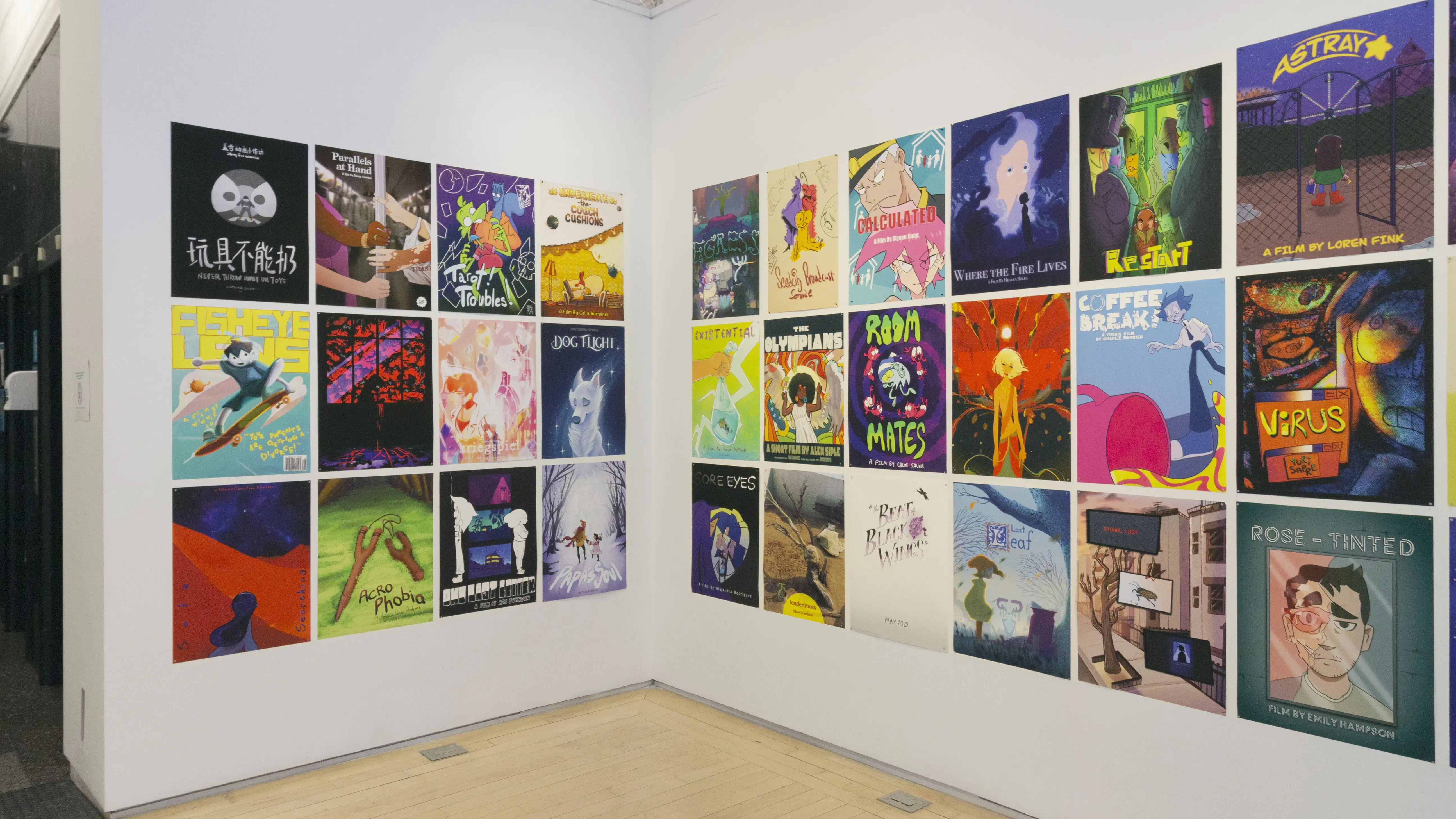 Multiple views of SVA Flatiron Windows and Flatiron Project Space. There are monitors hung in the Windows with films playing and film posters hung in the Flatiron Project Space.