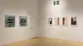 Multiple views of SVA Flatiron Gallery and Windows with installation, photographs, and textile throughout the gallery. 