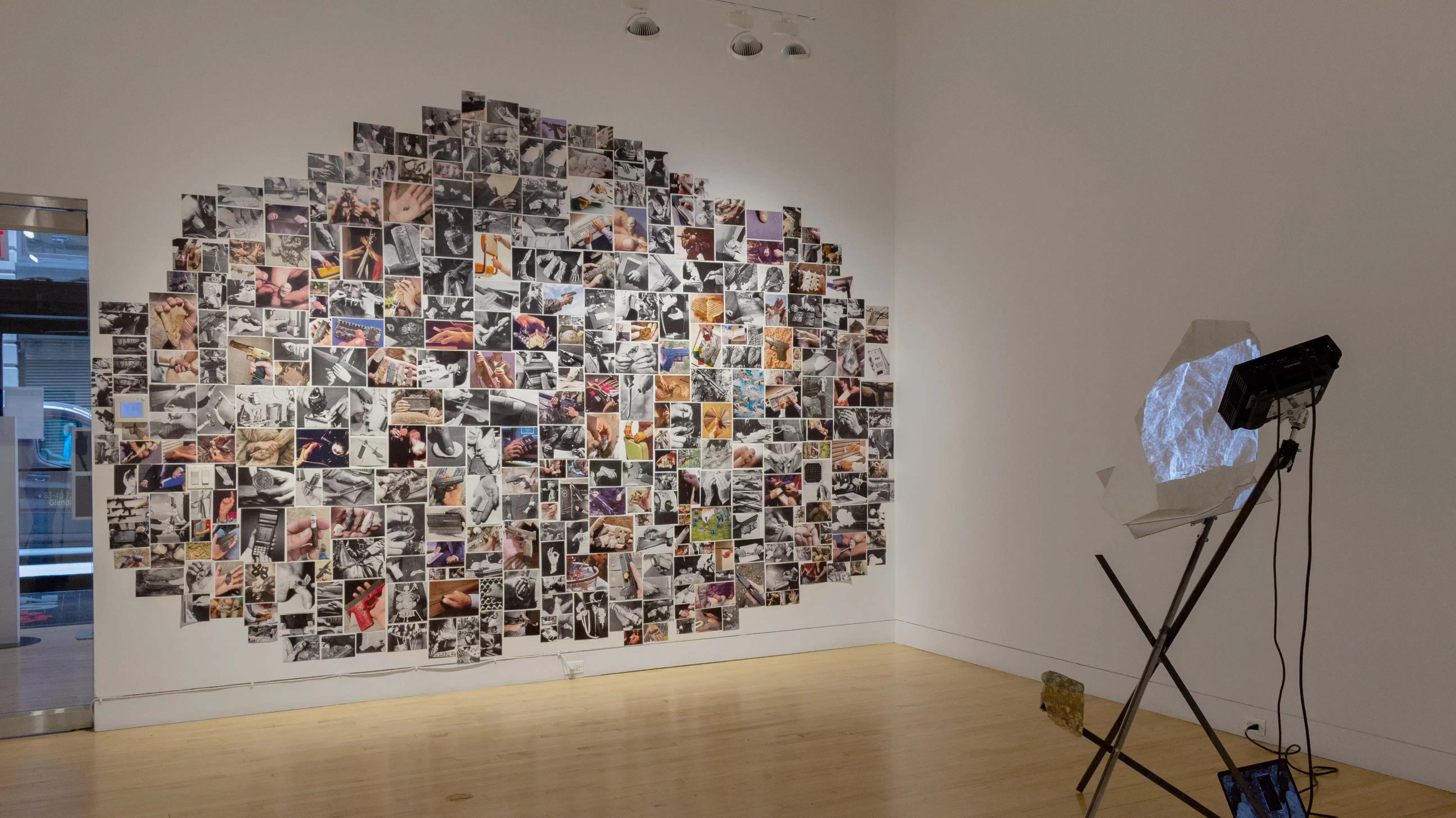 Multiple views of SVA Flatiron Gallery and Windows. There are photographs, collages, and installation work throughout the gallery and displayed in the windows. 