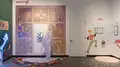 Multiple views of SVA Gramercy Gallery with individual exhibitions of students work. There is drawing and installation throughout the gallery. 