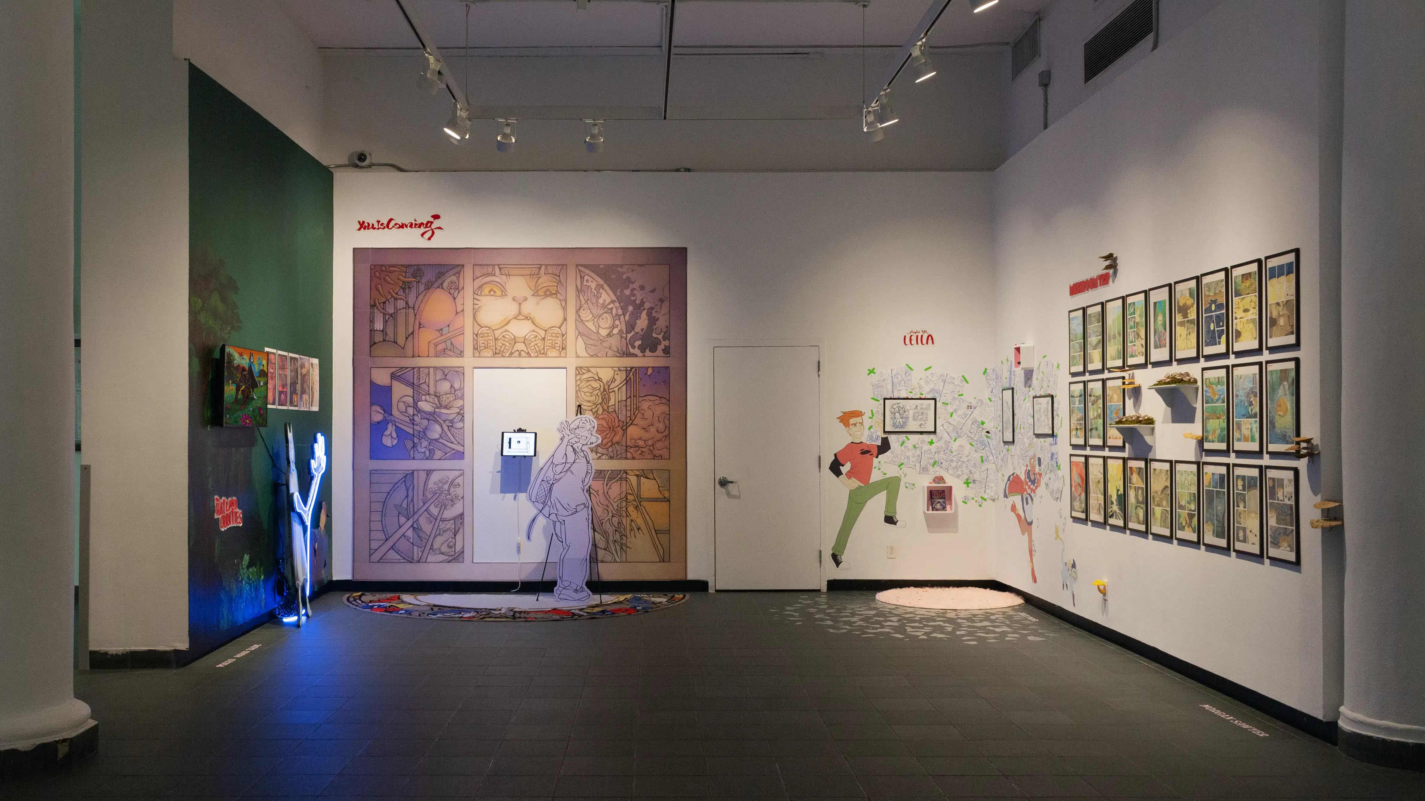 Multiple views of SVA Gramercy Gallery with individual exhibitions of students work. There is drawing and installation throughout the gallery. 