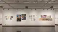 Multiple views of SVA Chelsea Gallery. There is illustrations and paintings hung on the walls. There are multiple shelves throughout the gallery with books places on them.