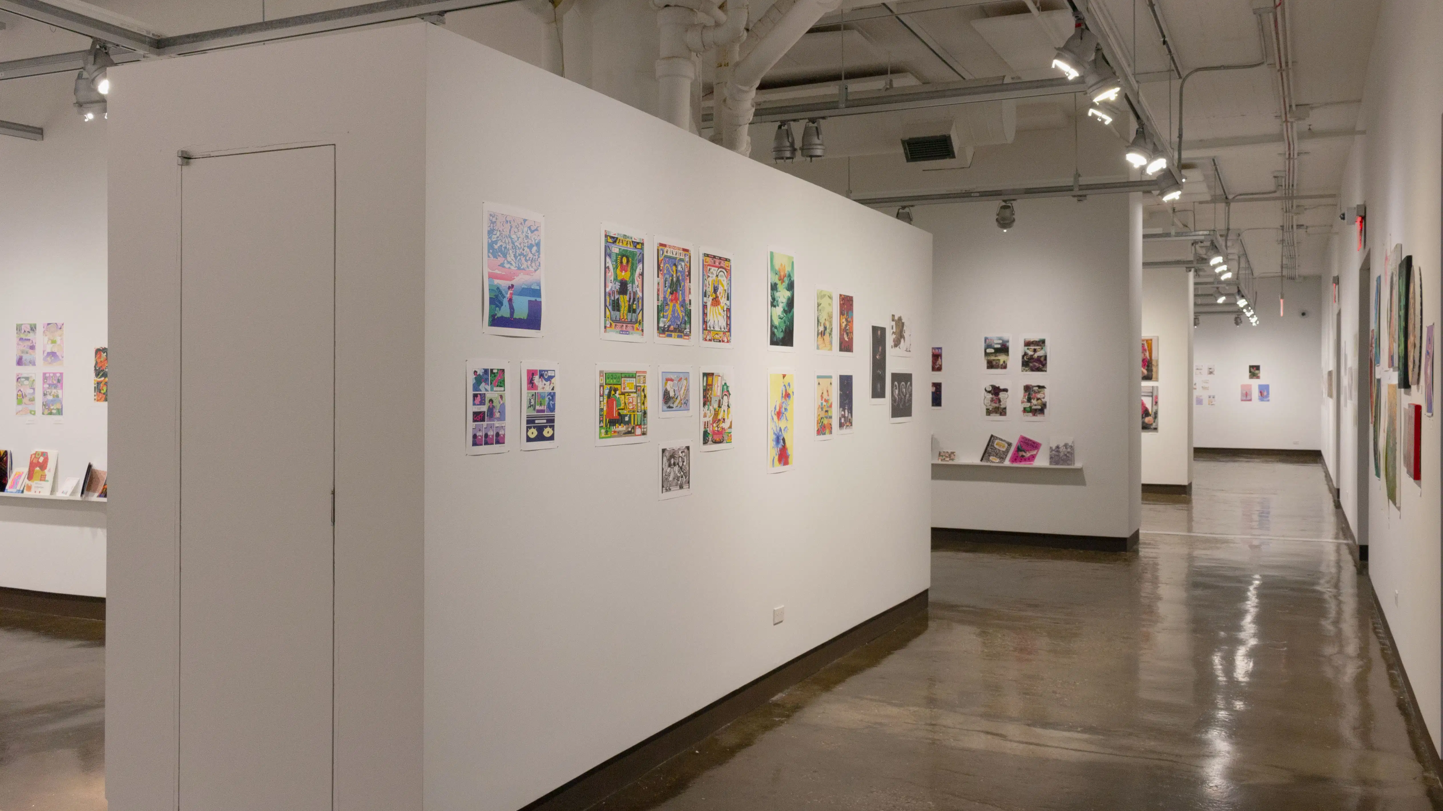 Multiple views of SVA Chelsea Gallery. There is illustrations and paintings hung on the walls. There are multiple shelves throughout the gallery with books places on them.