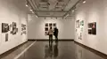 Multiple views of SVA Chelsea Gallery. There are photographs hung on the wall, installations and projections throughout the gallery. 