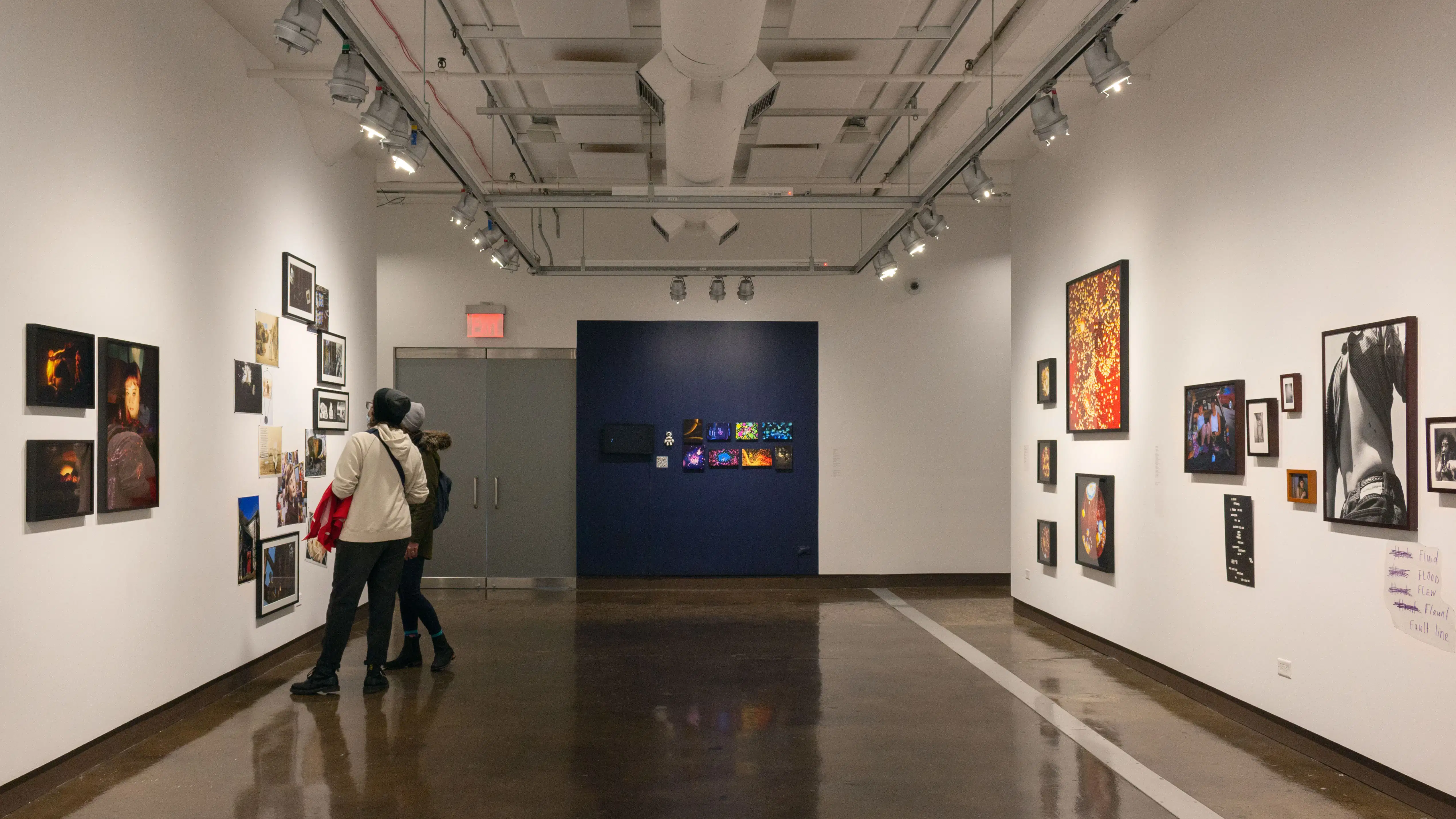 Multiple views of SVA Chelsea Gallery. There are photographs hung on the wall, installations and projections throughout the gallery. 