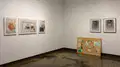 Multiple views of SVA Chelsea Gallery. There are photographs hung on the wall, installations and projections throughout the gallery. 